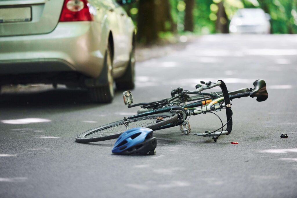 Bike on the ground after being involved in an accident